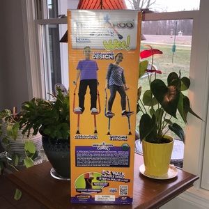 NEW -Stilts - Adjustable.  Duplicate Gift on our end!  Steel - Box never opened.